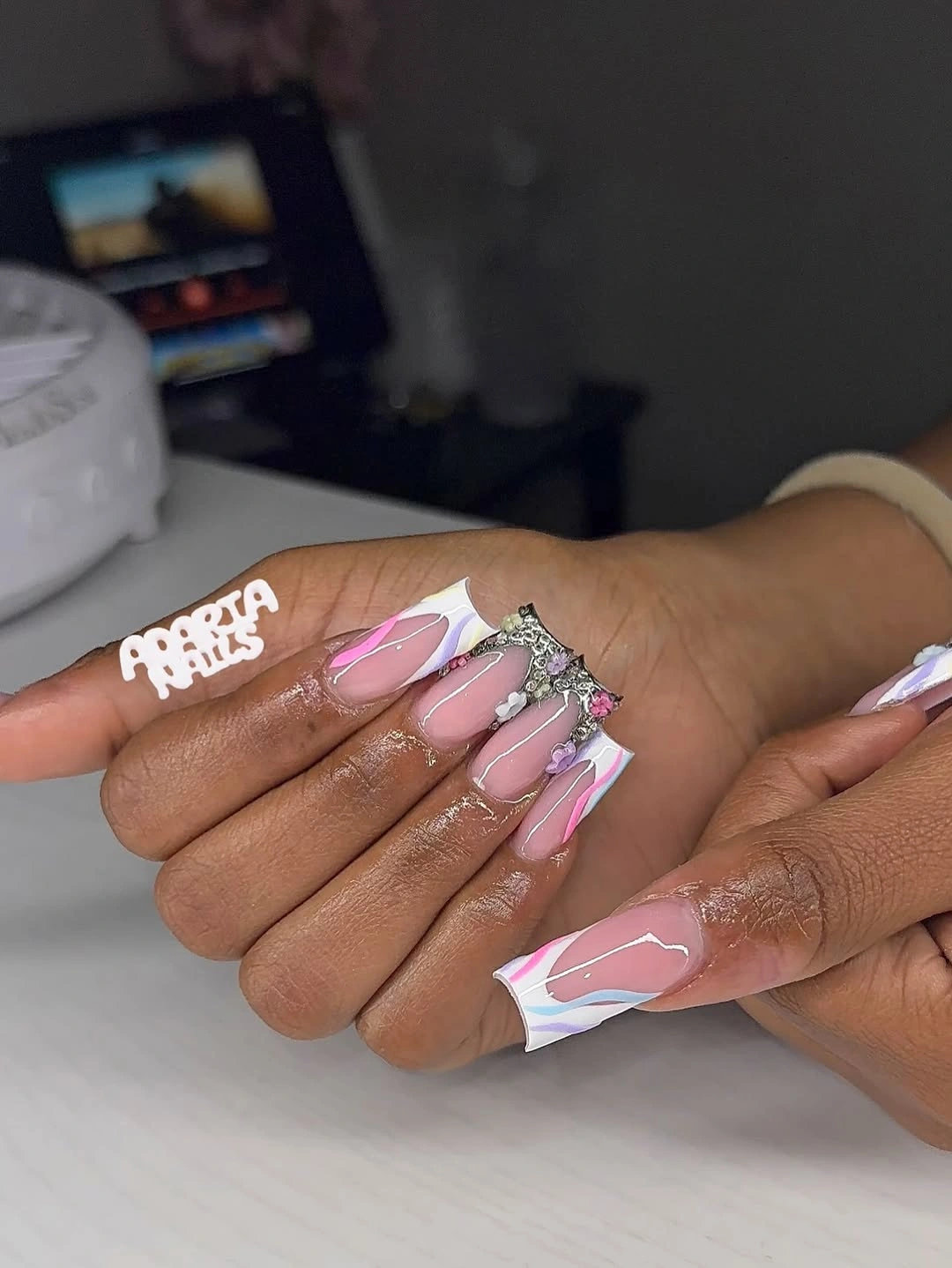 Long pink coffin nails with white lilac abstract tips