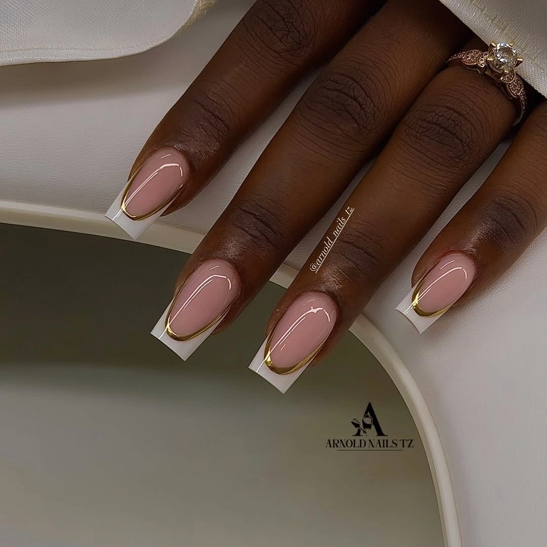 Pink nude square nails with thin gold French lines