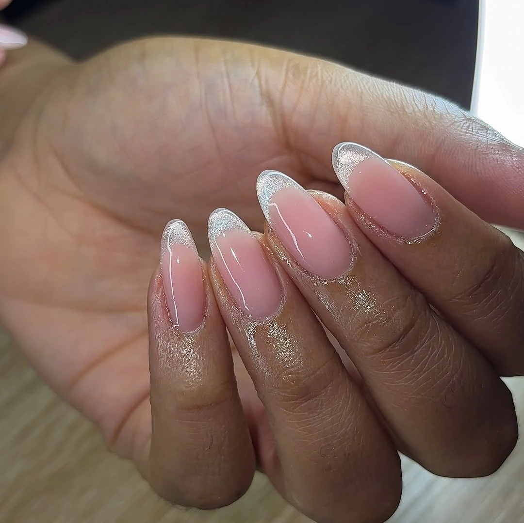 Pink almond nails with delicate silver white micro tips