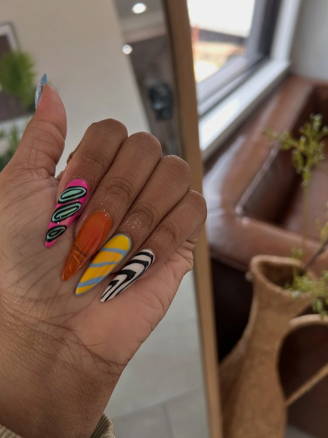 Long mixed nails with neon waves stripes and graphic lines