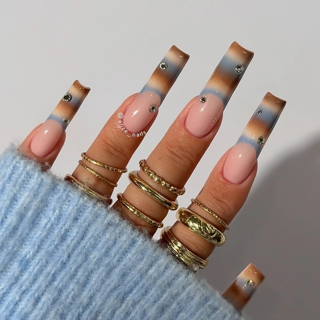 Long square nails with smoky brown blue tip panels
