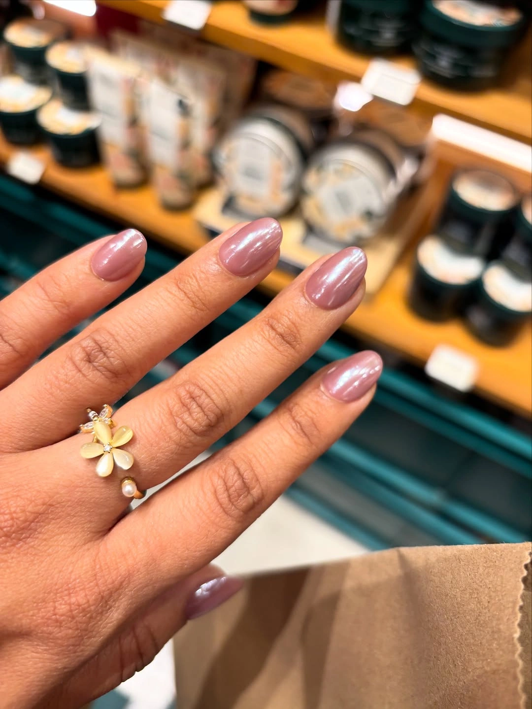 Short rounded mauve nails with pearly shine