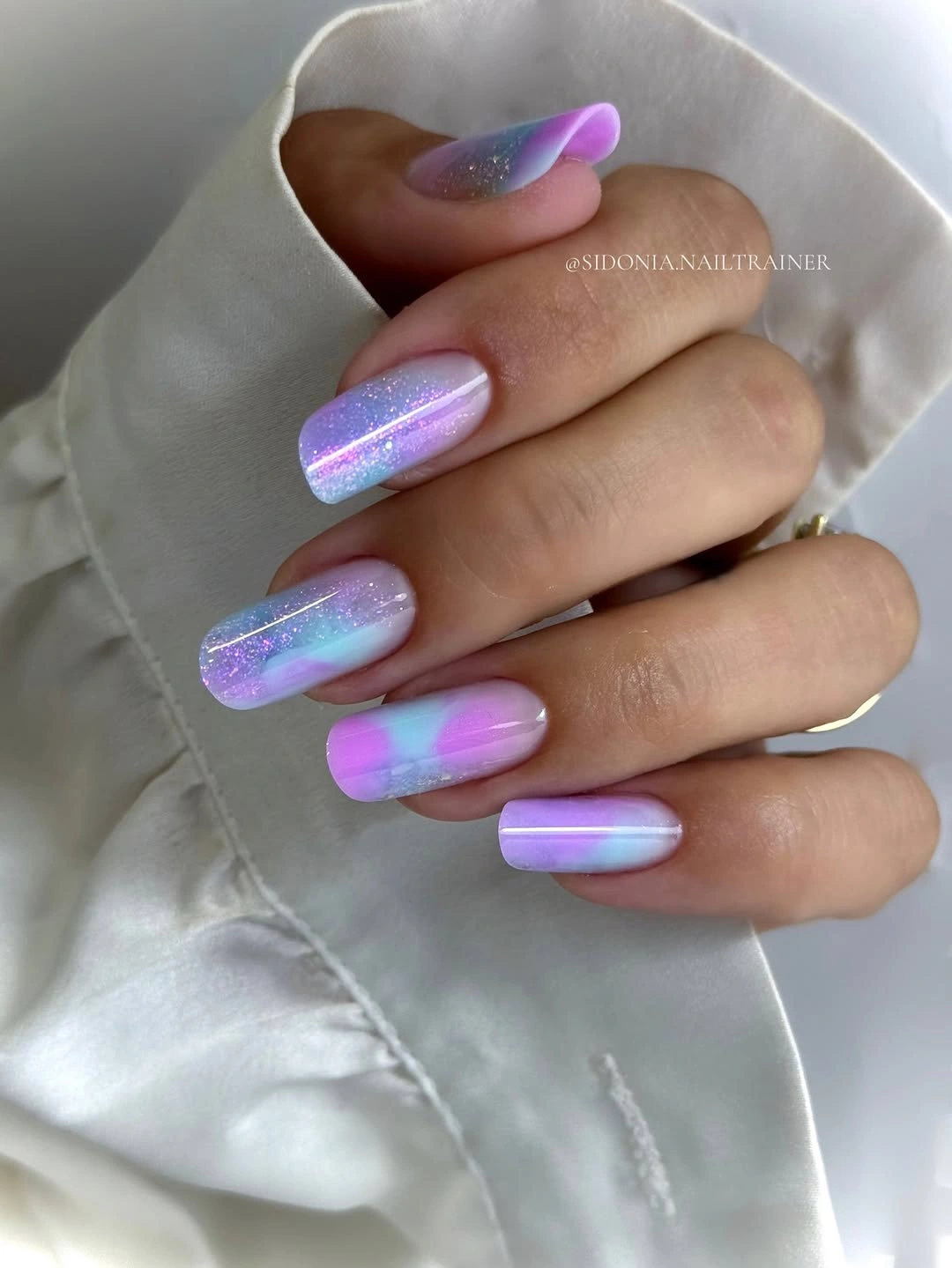 Long square lavender pink nails with iridescent sparkle