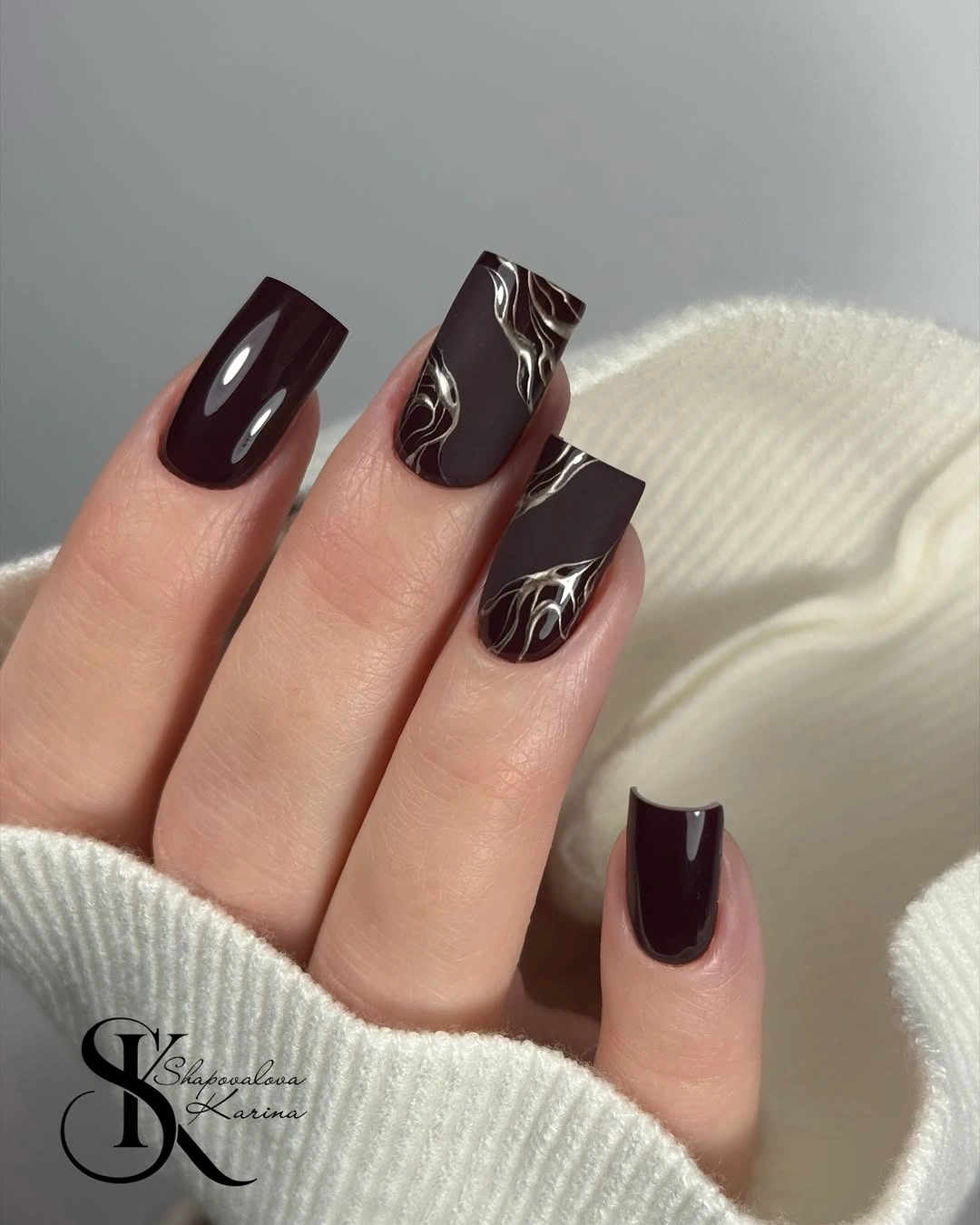 deep plum square nails with thin silver abstract curves