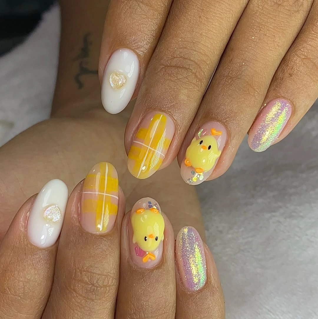 Short yellow plaid nails with cute accents and pink glitter