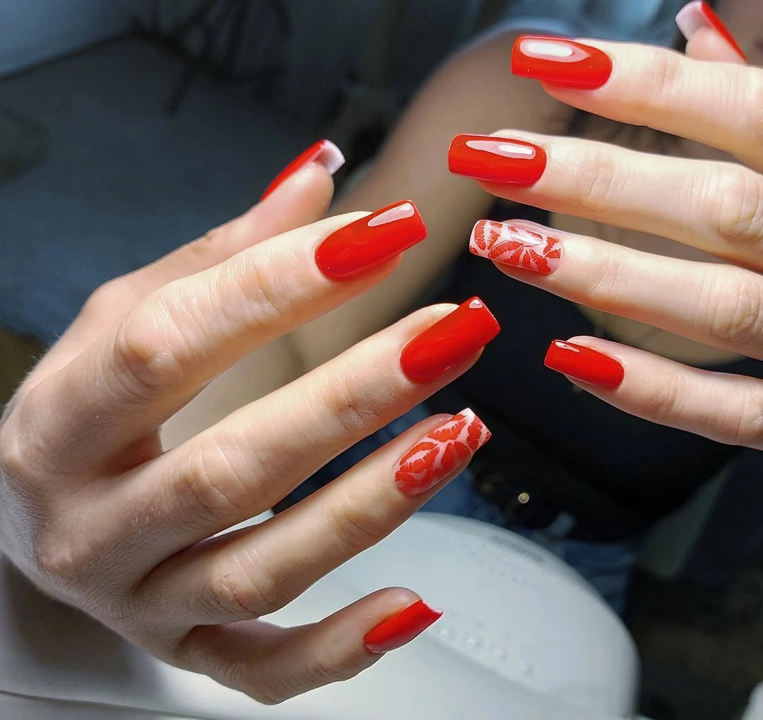 red square nails with leafy accent art