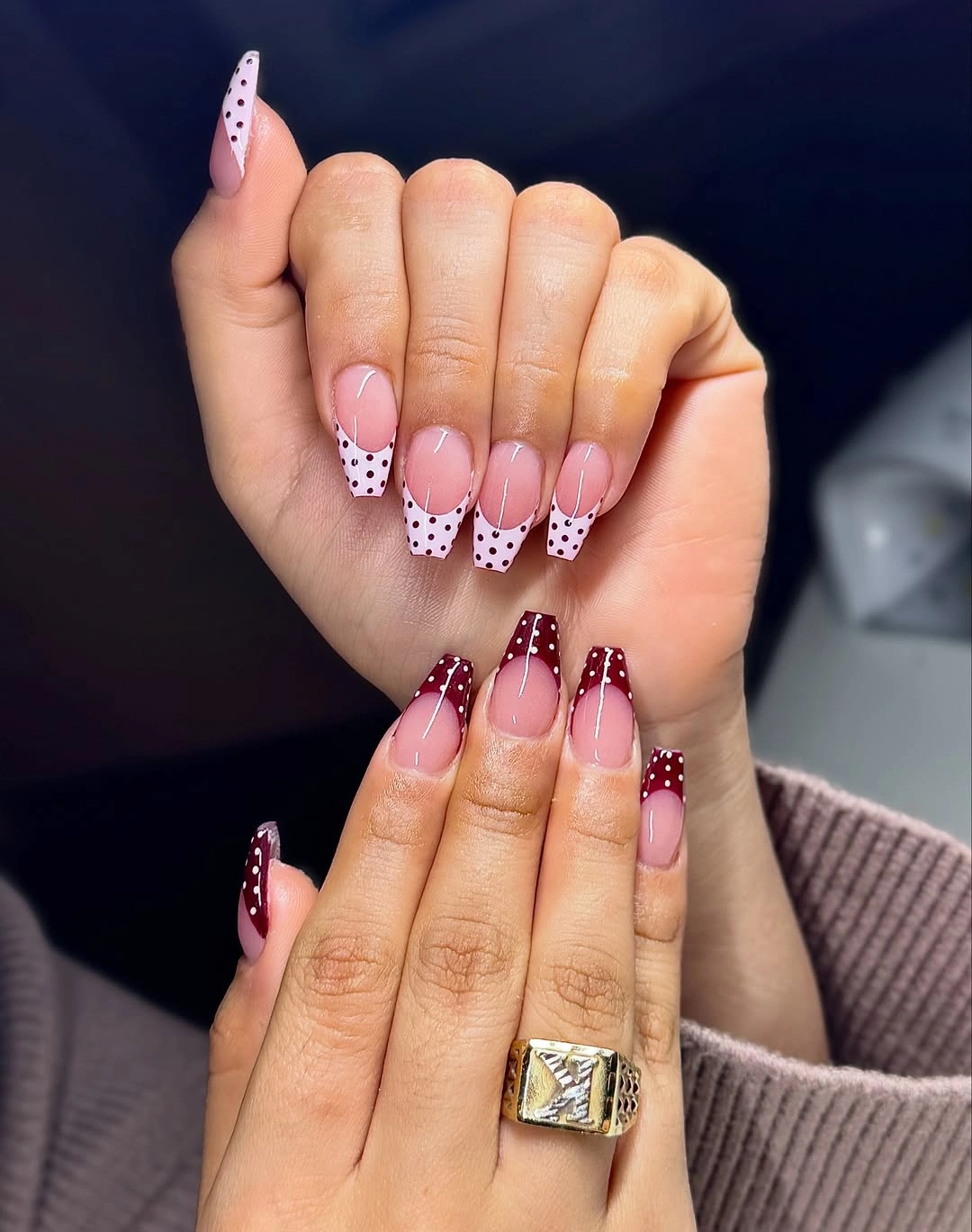 Pink tapered square nails with dotted white and burgundy French tips