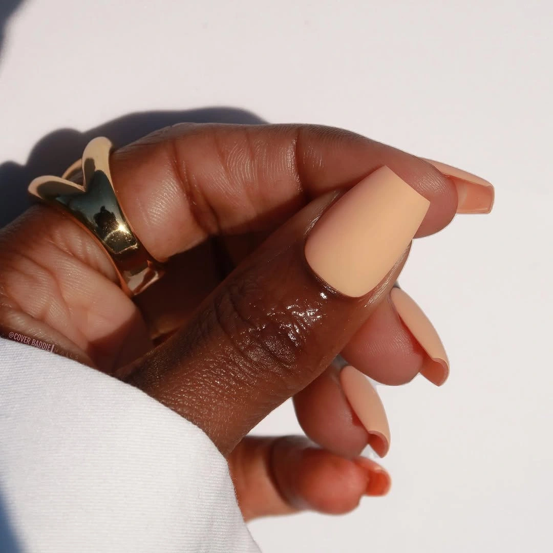 Medium square nails in a quiet warm beige finish