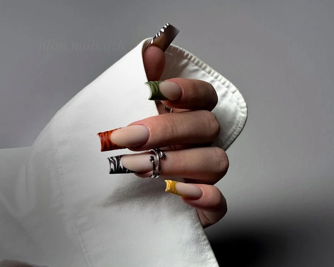 Long square neutral nails with brown black graphic sections