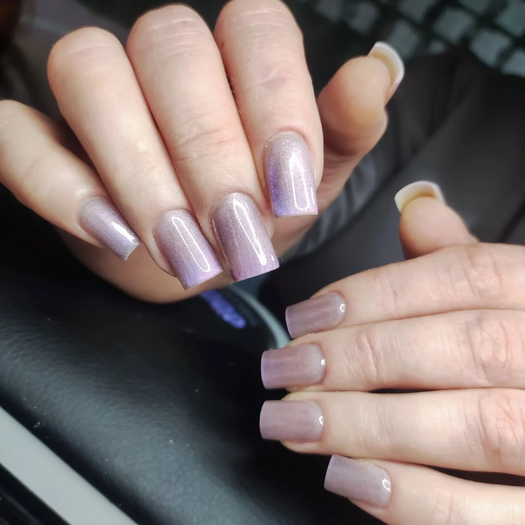 Short square sheer lilac nails with a soft glow