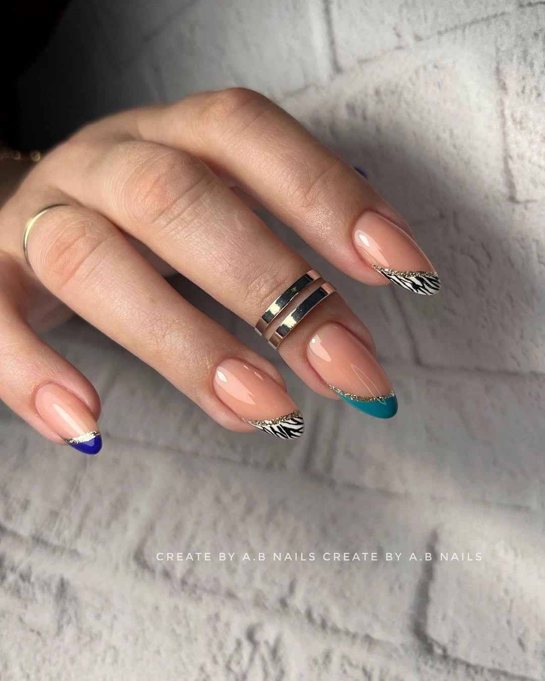 Short milky nails with narrow cherry-red French tips