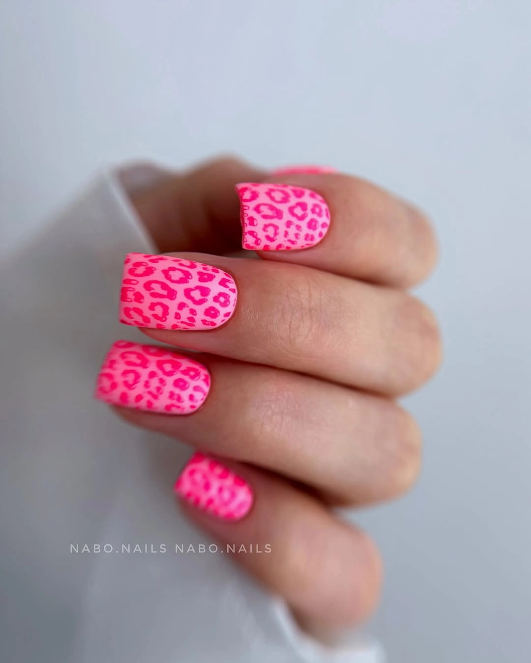 Medium pale pink square nails with a subtle light tip