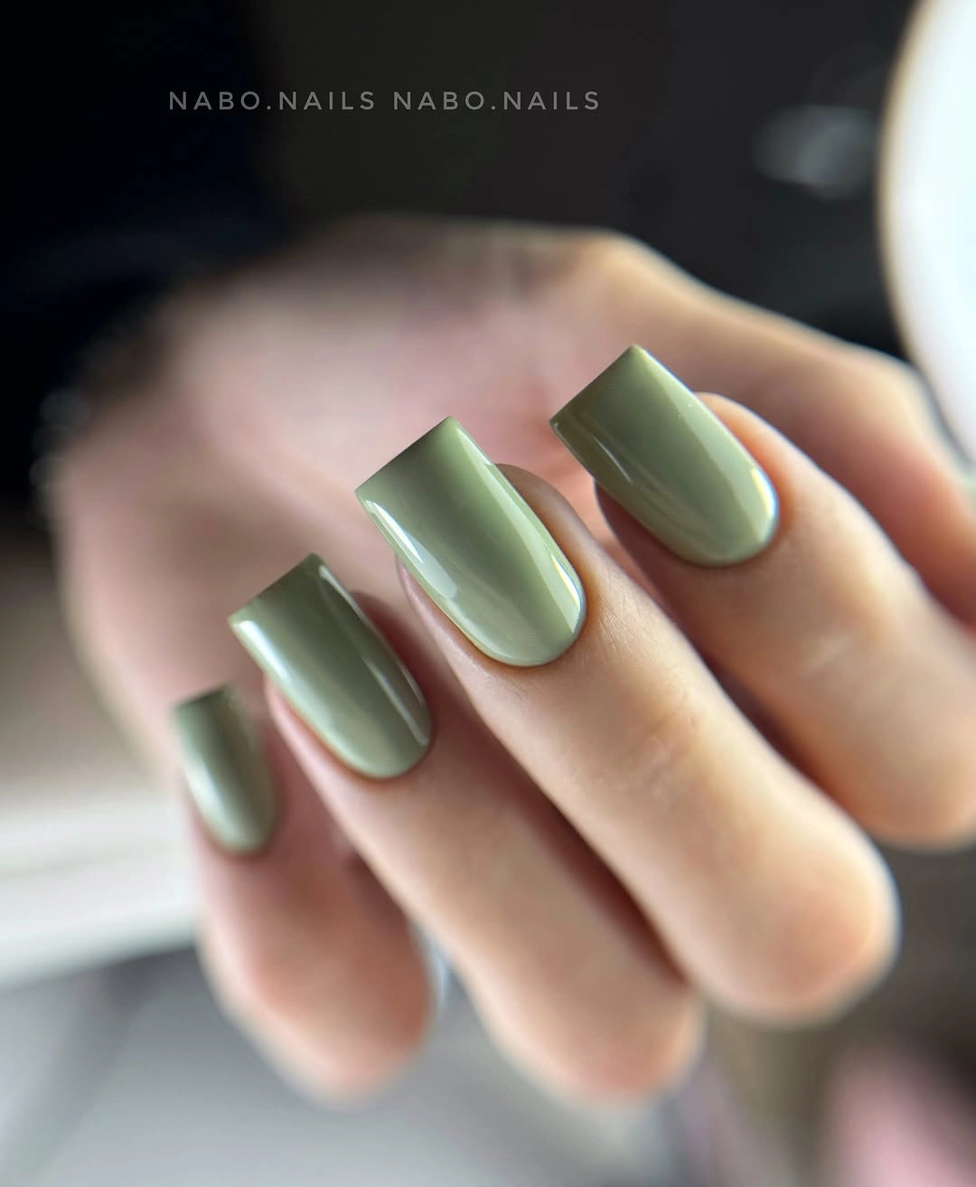 Short glossy muted sage-green square nails