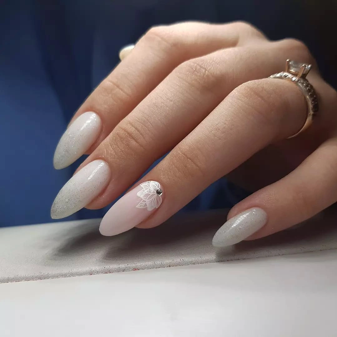 White almond wedding nails with floral accent
