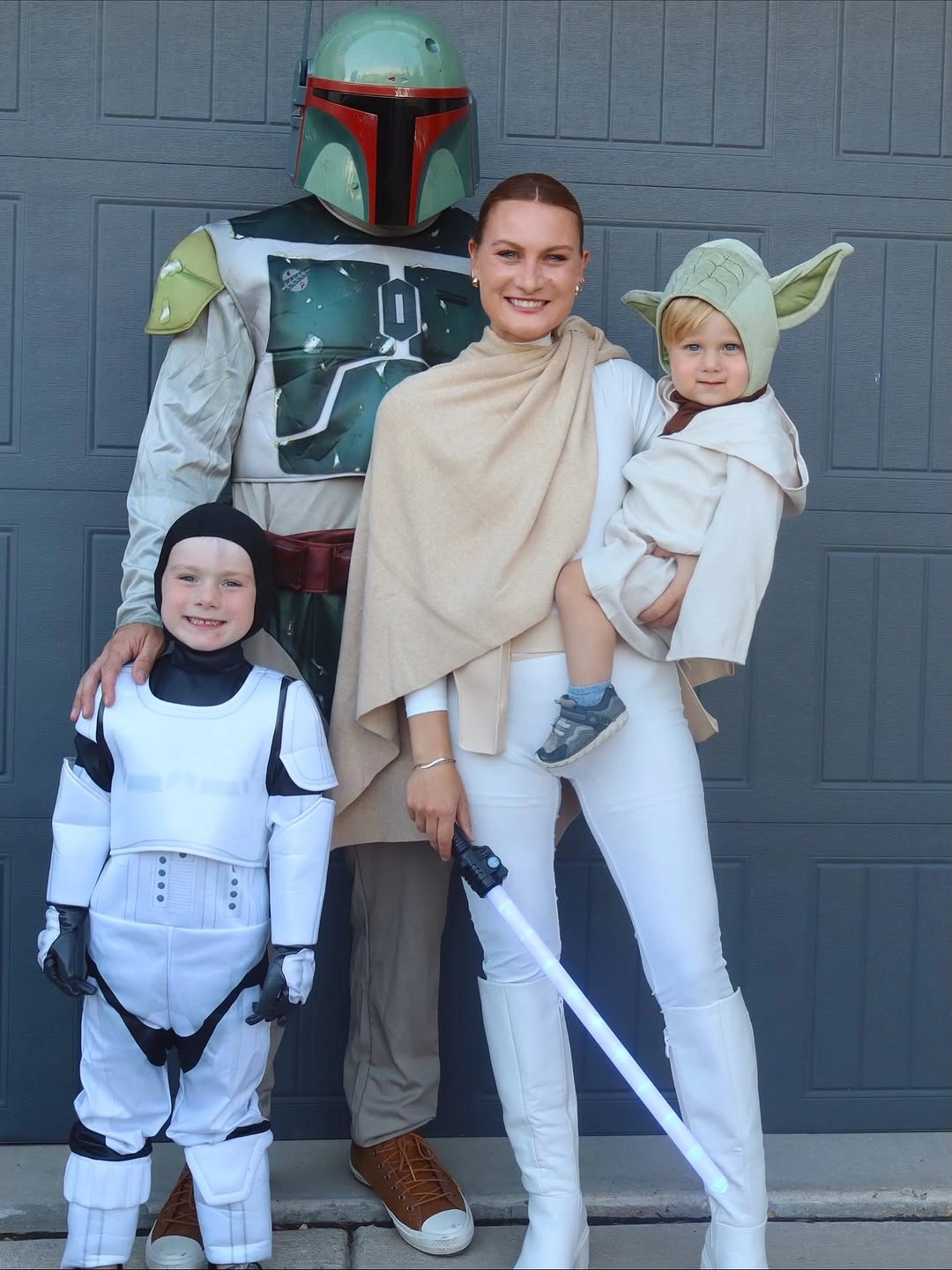 Family costumes with green armor cream robes and white outfits