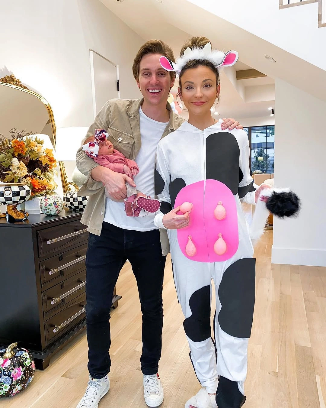 Family Halloween costume with white cow print and casual black white outfits