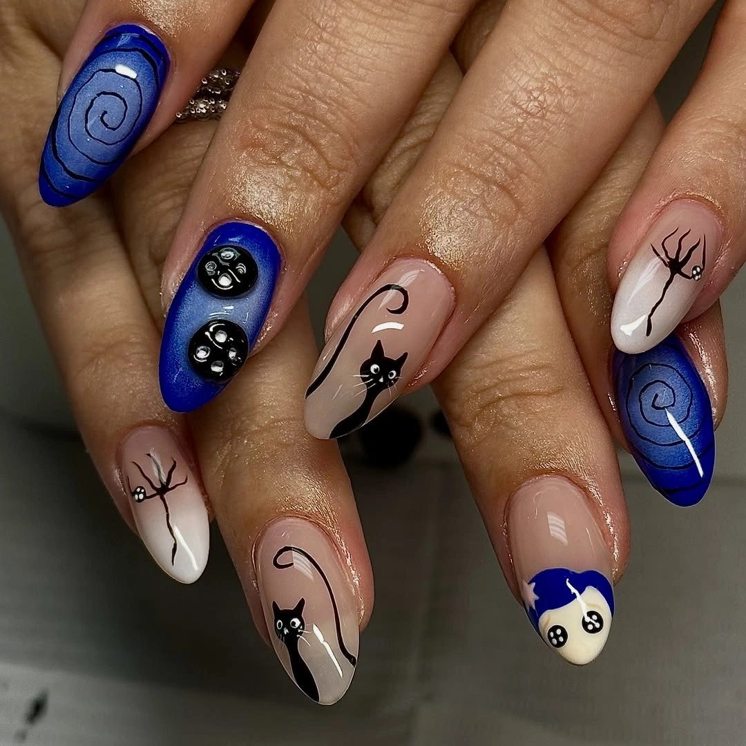 Nude and vivid royal blue Halloween nails with black cat and spiral spooky details