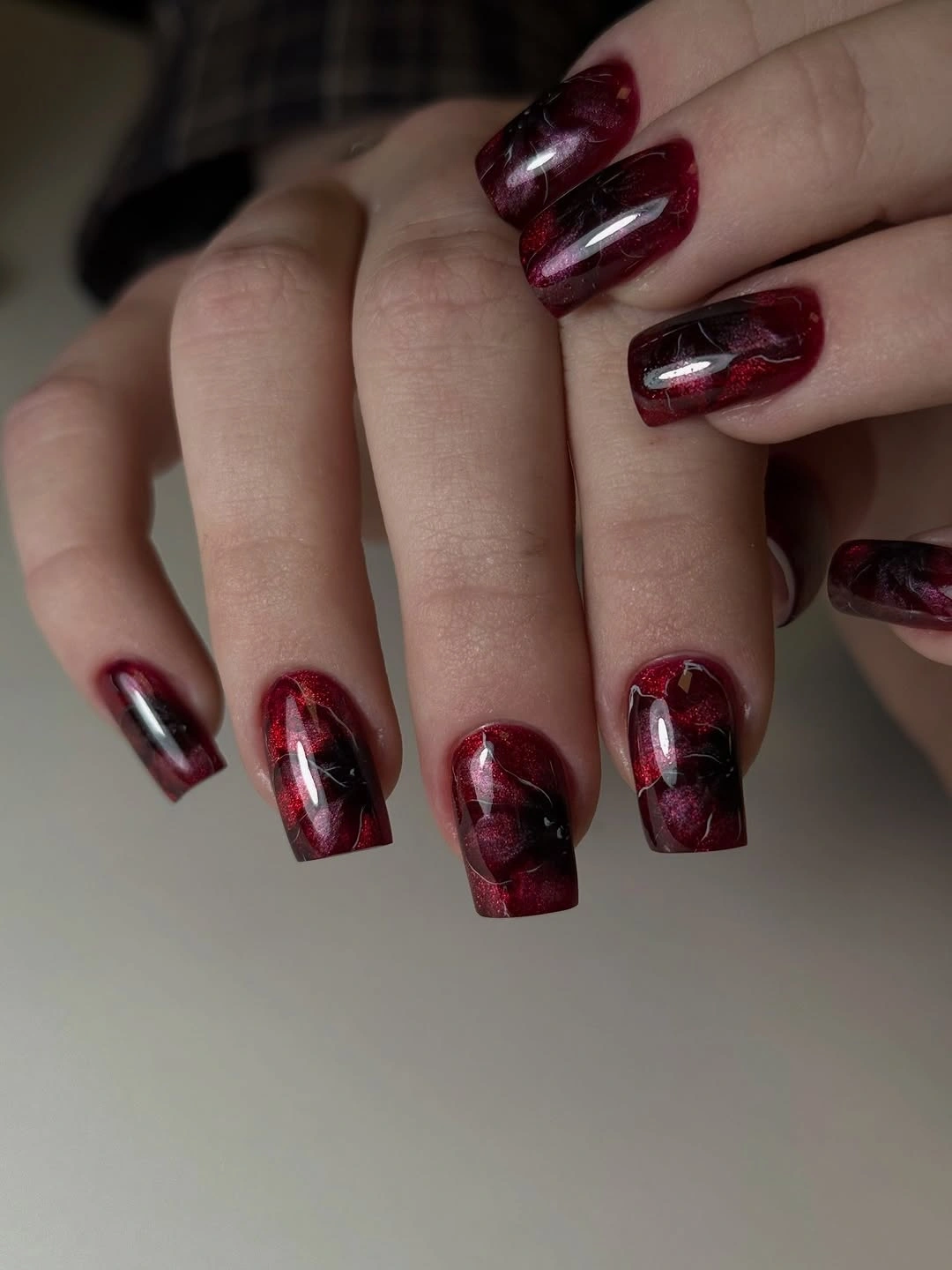 Long square nails with smoky black red burgundy marbling