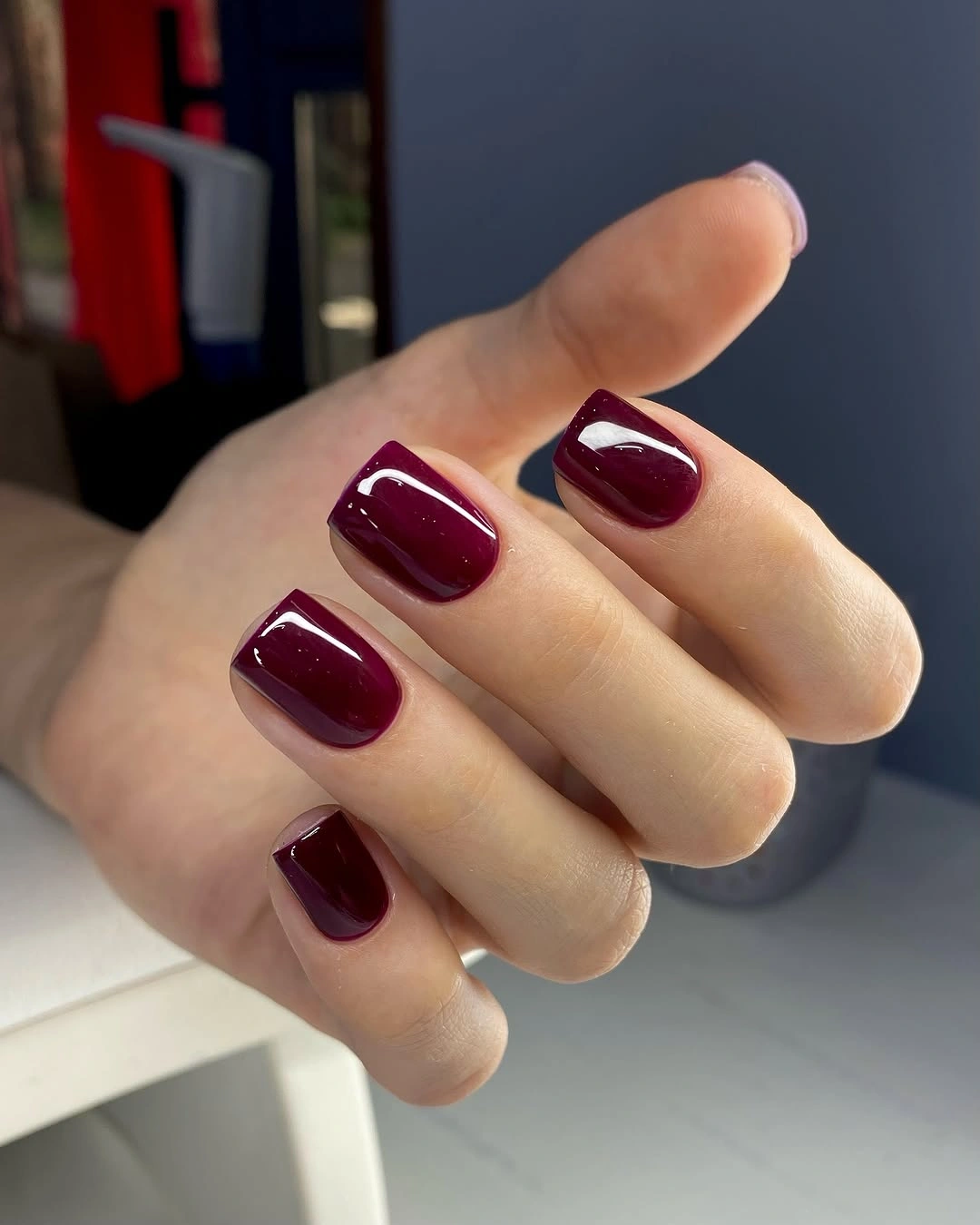Short squared nails in opaque wine burgundy