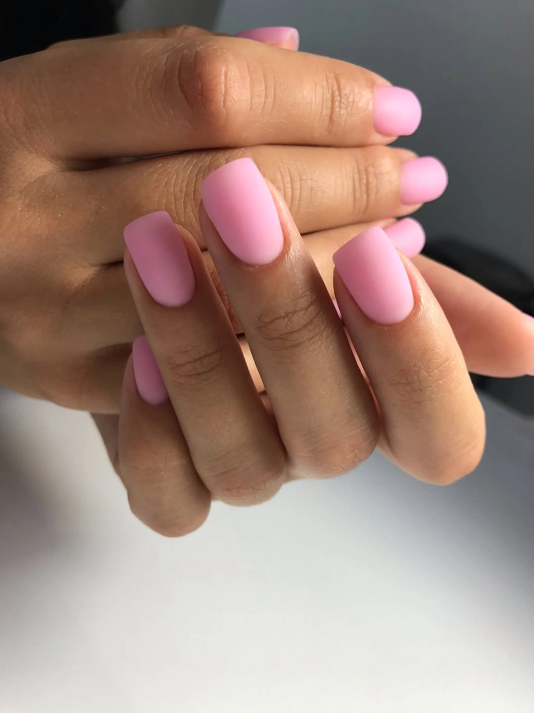 Long square nails in a soft even matte pink shade