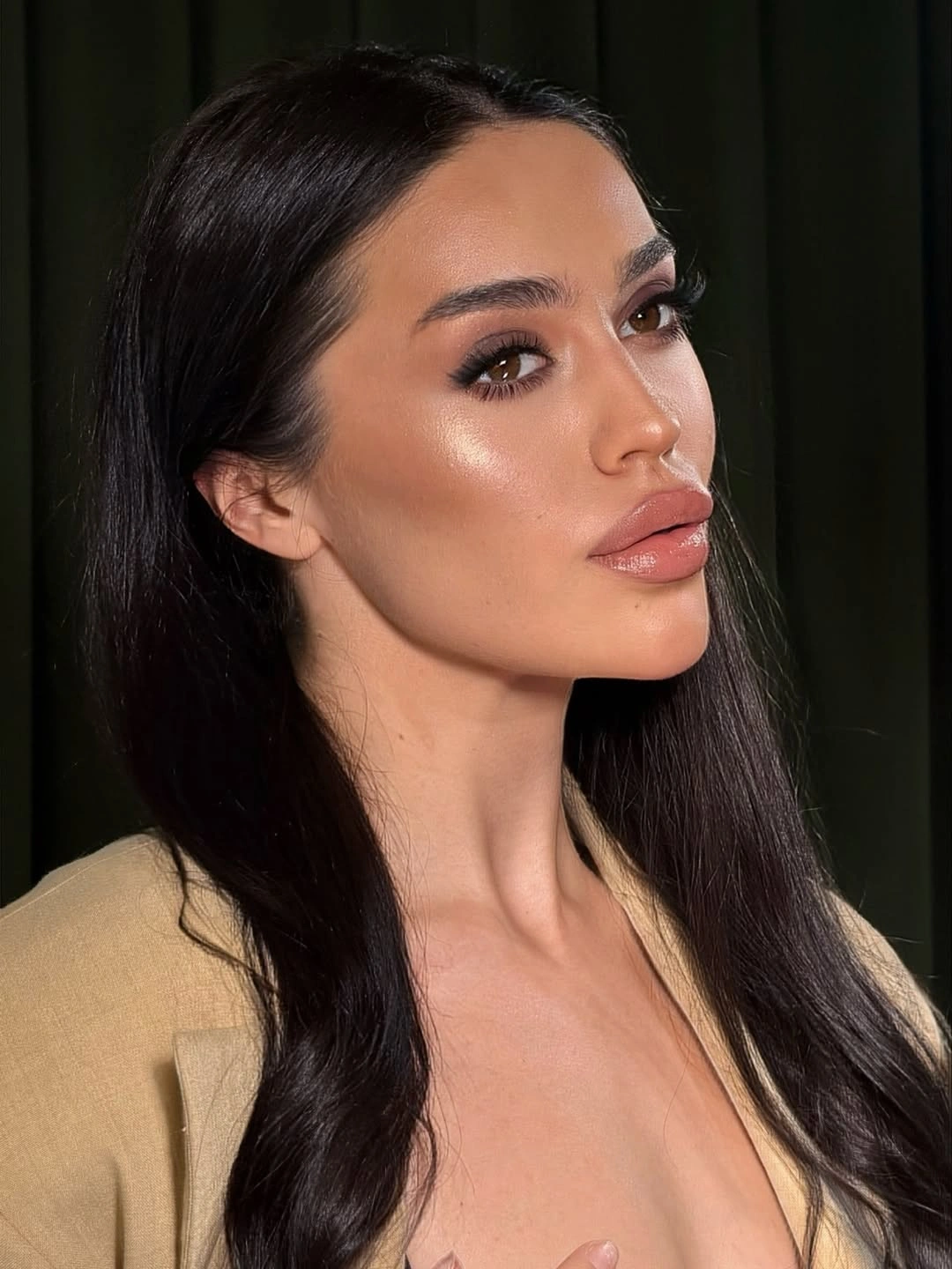 Long dark sleek middle-parted hair with straight lengths