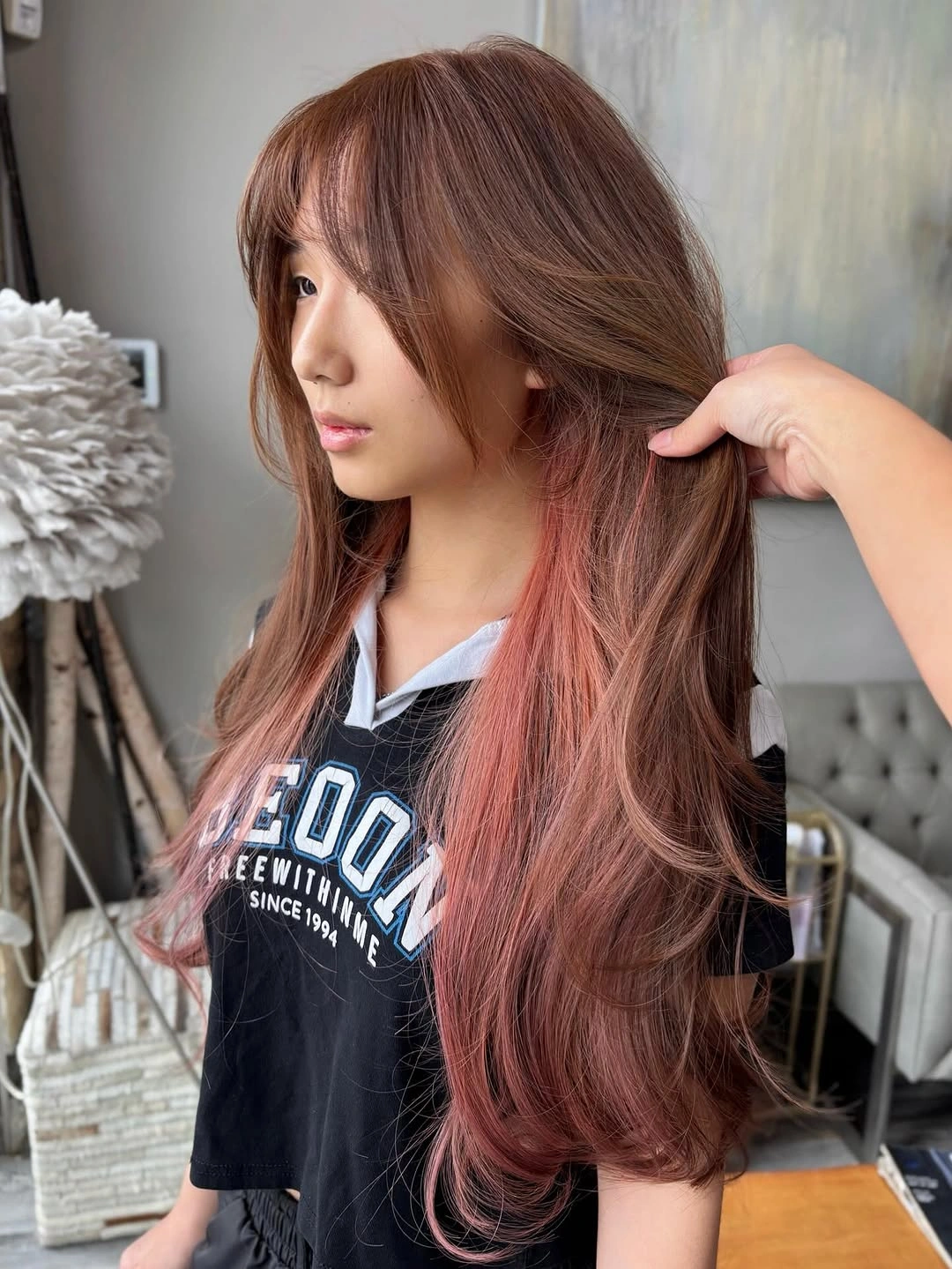 Muted copper rose hair with face framing pieces and loose waves