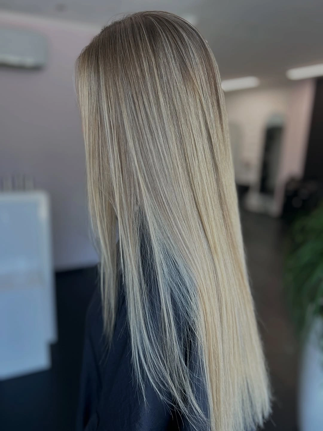 Very long cool silver blonde hair with straight smooth lengths