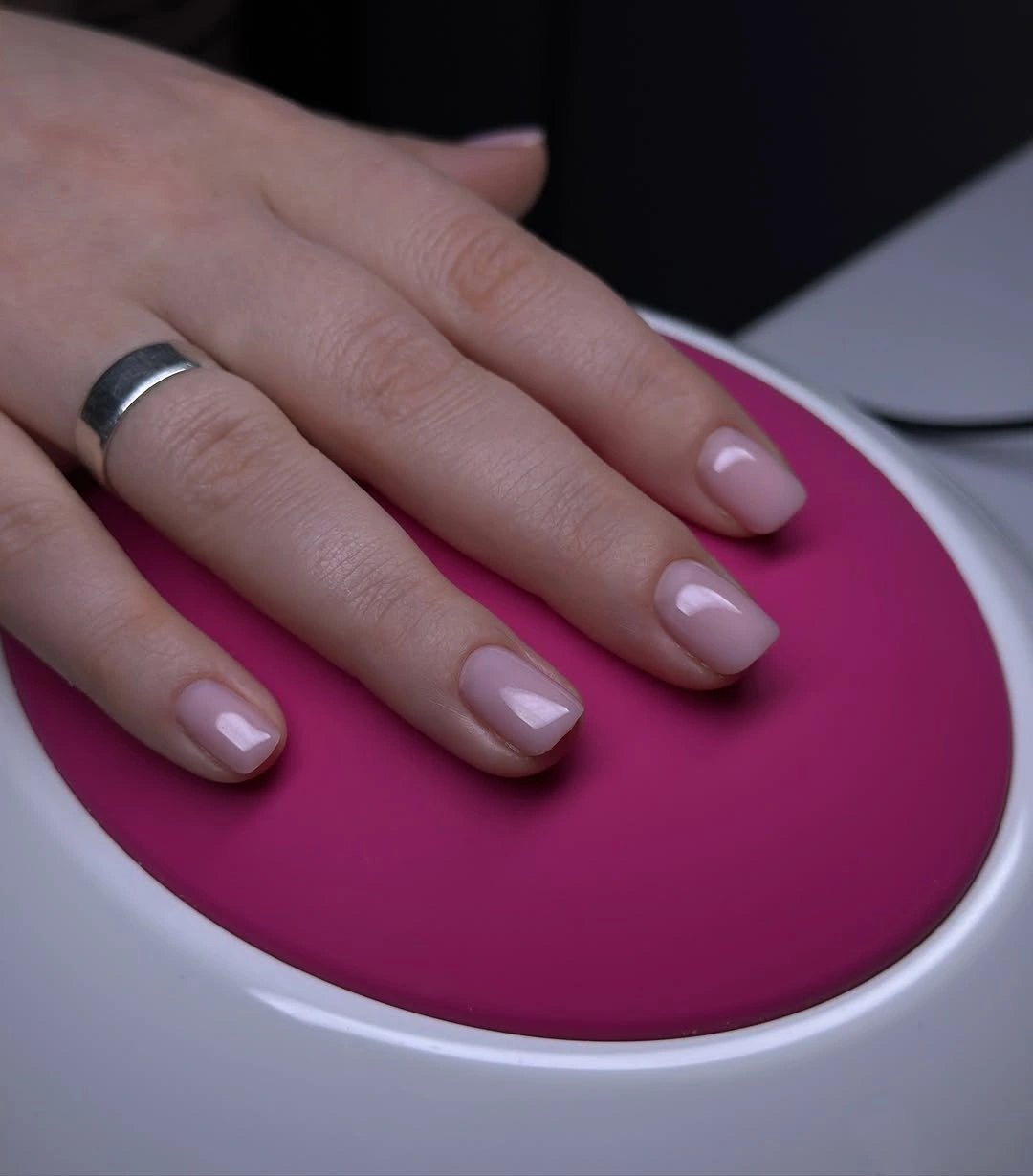 Short rounded square nails in a smooth pale blush pink finish