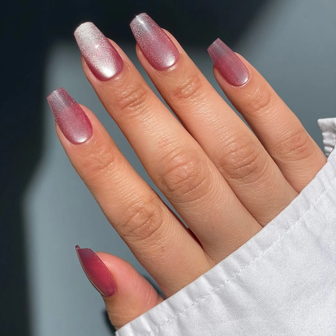 Long tapered square nails with a rose pink and silver gradient