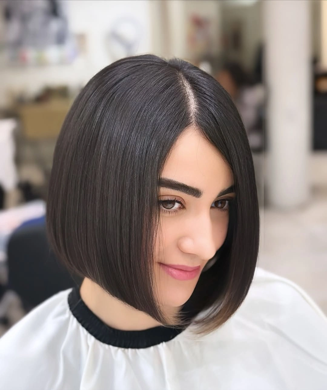 Glossy dark classic bob with center part