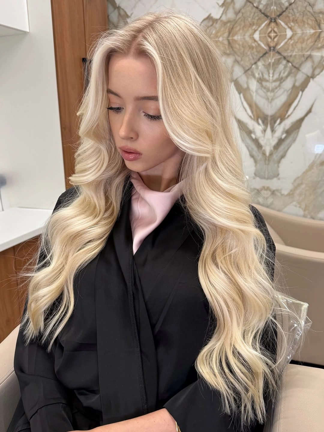 Very long ivory blonde hair with soft flowing waves