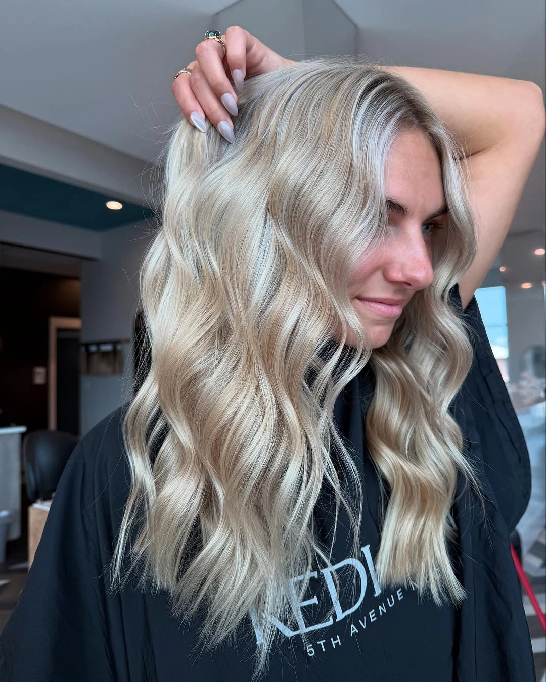 Long pale blonde waves with subtle silvery beige dimension