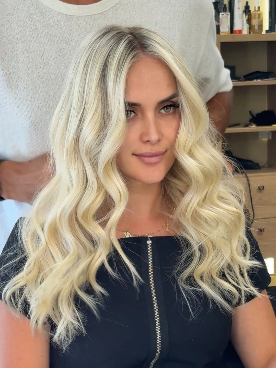 Very long creamy blonde waves with slightly deeper roots