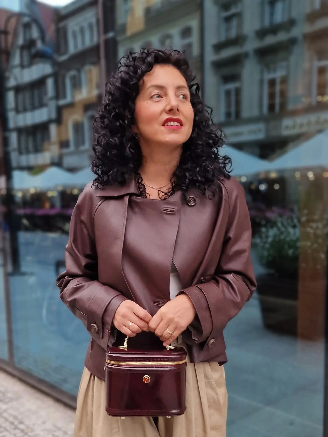 Mauve cropped jacket with beige pleated wide trousers