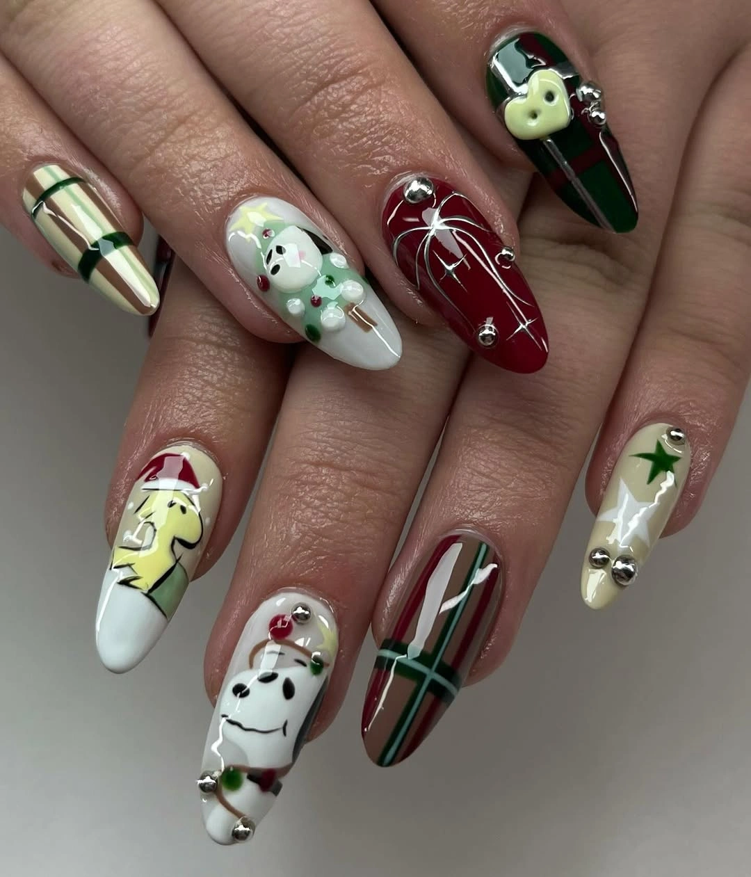 Long Christmas nails with plaid snowman tree ornaments and studs
