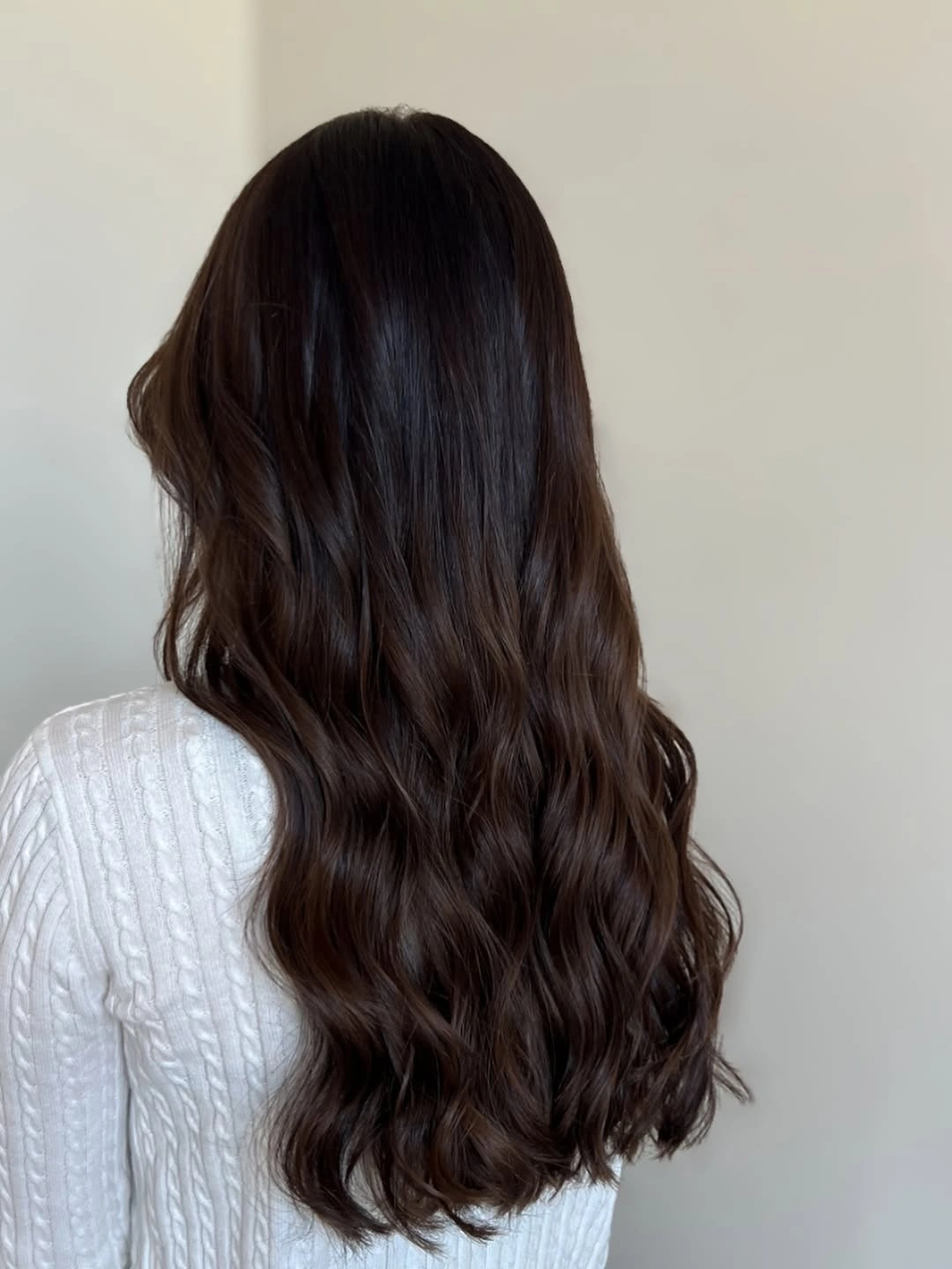 Very long dark brunette waves with reddish chocolate warmth