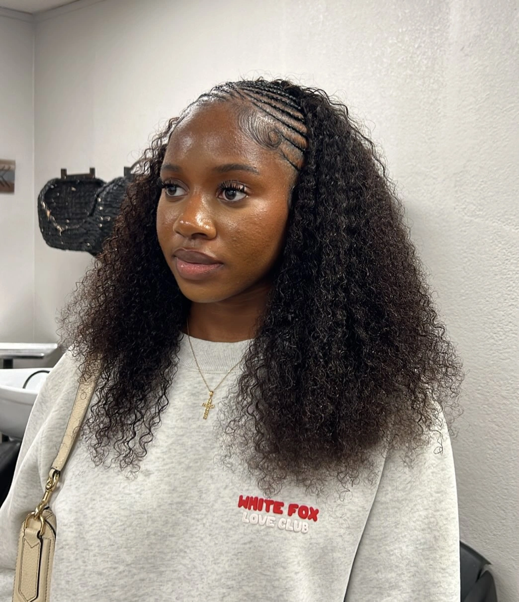 Side rows with loose black curls and styled edges