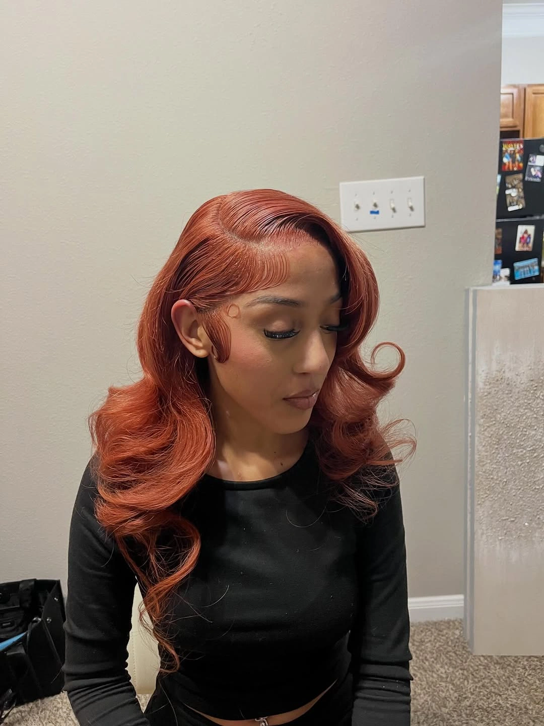 Long copper auburn waves with side part and curled ends