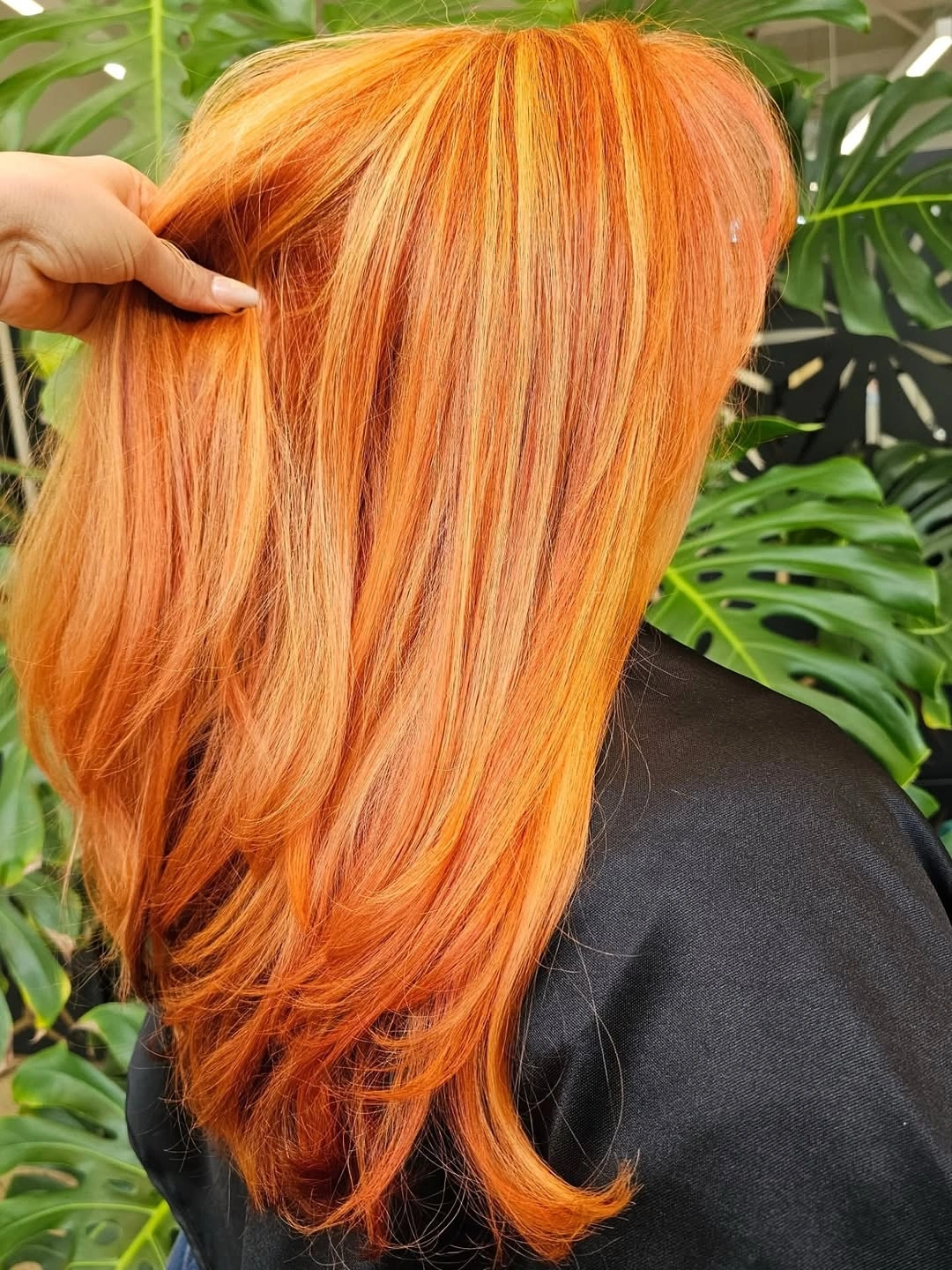 Long vivid orange copper hair with brighter vertical strands