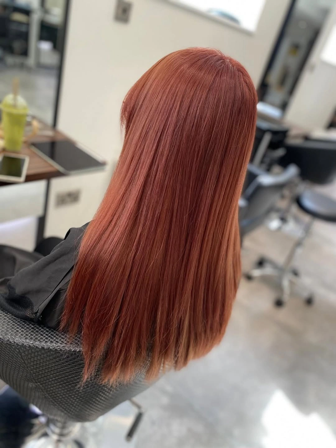 Medium straight copper red lob viewed from the back