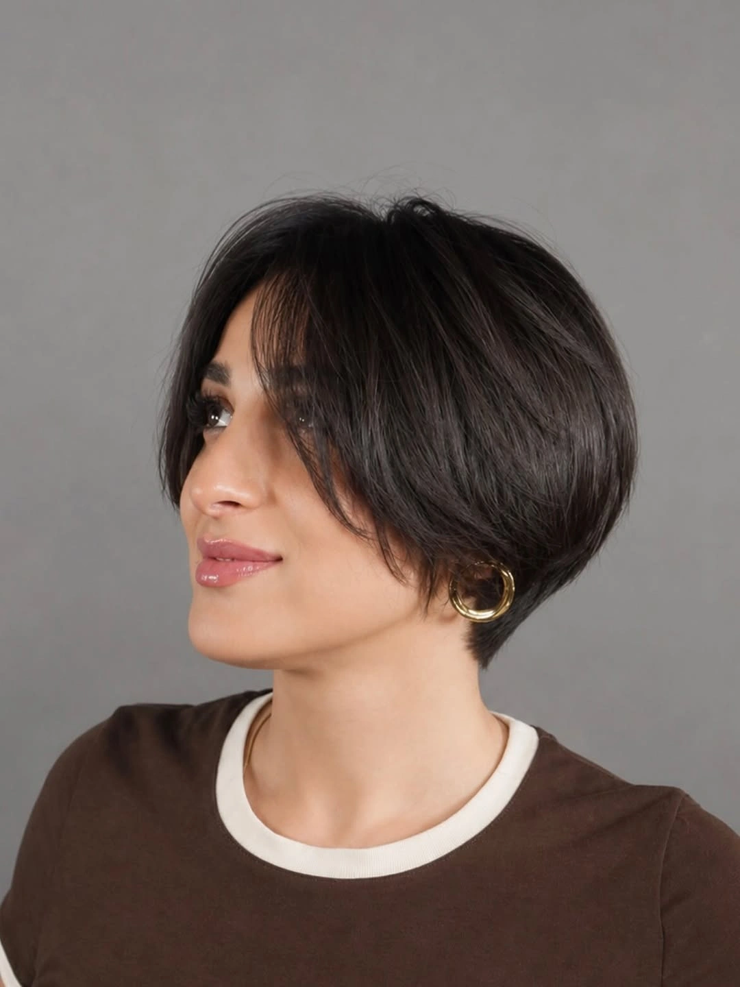Short dark brunette rounded bob with soft curtain fringe