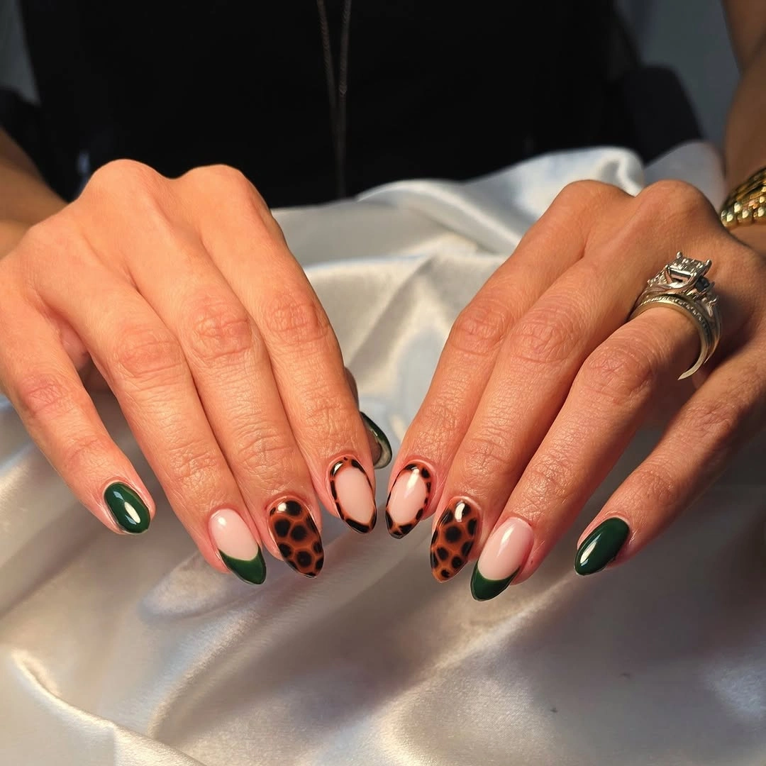 Oval nails with green tips and brown leopard-like spots