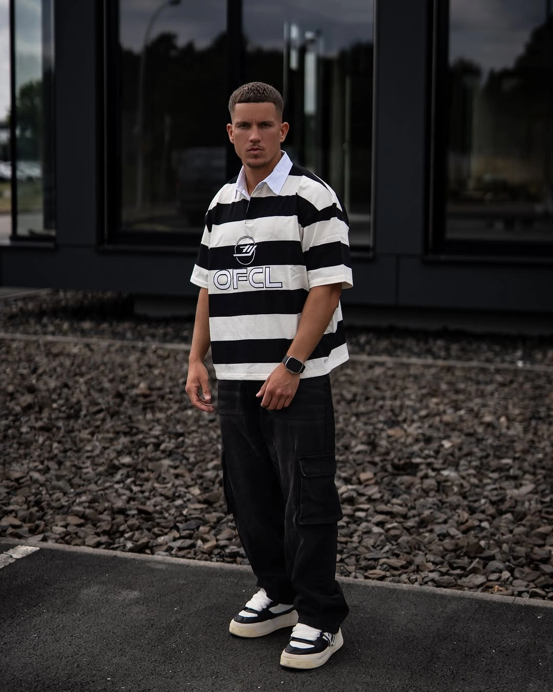 Black white plaid overshirt cuffed light jeans burgundy shoes and knit cap