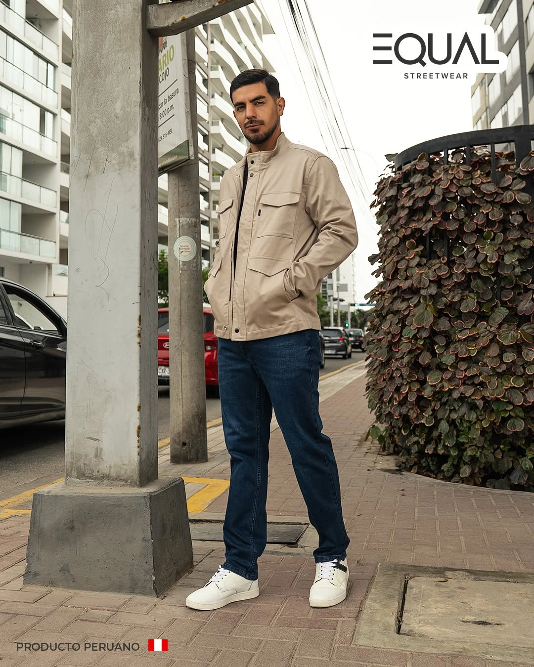 Gray overshirt over black layers dark denim and tan boots
