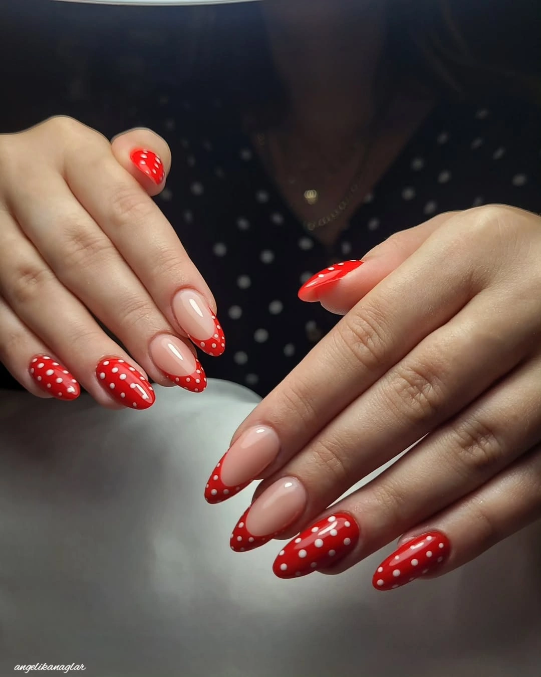 Medium nude almond nails with red dotted tips