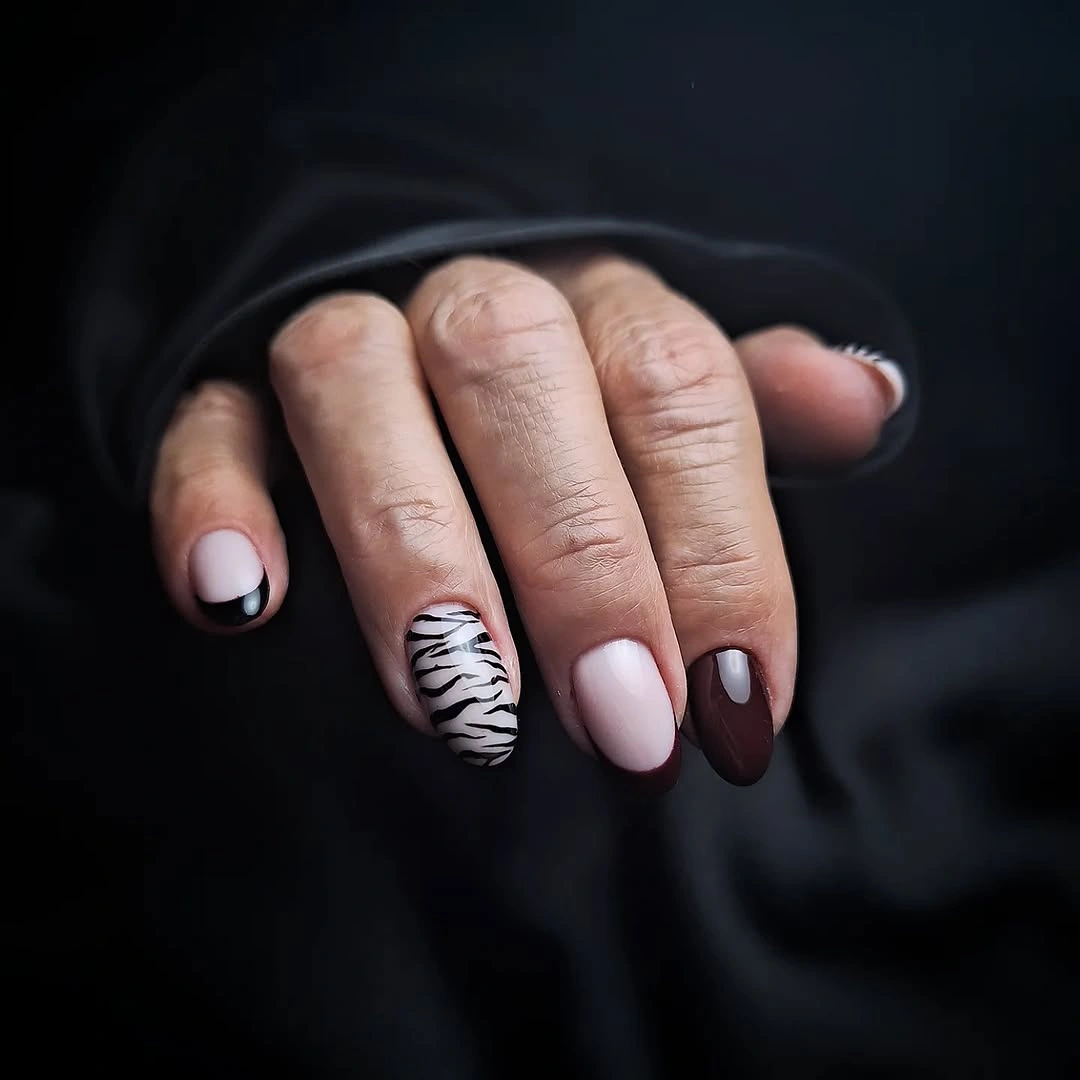 Mixed neutral short nails with zebra-like stripe accent