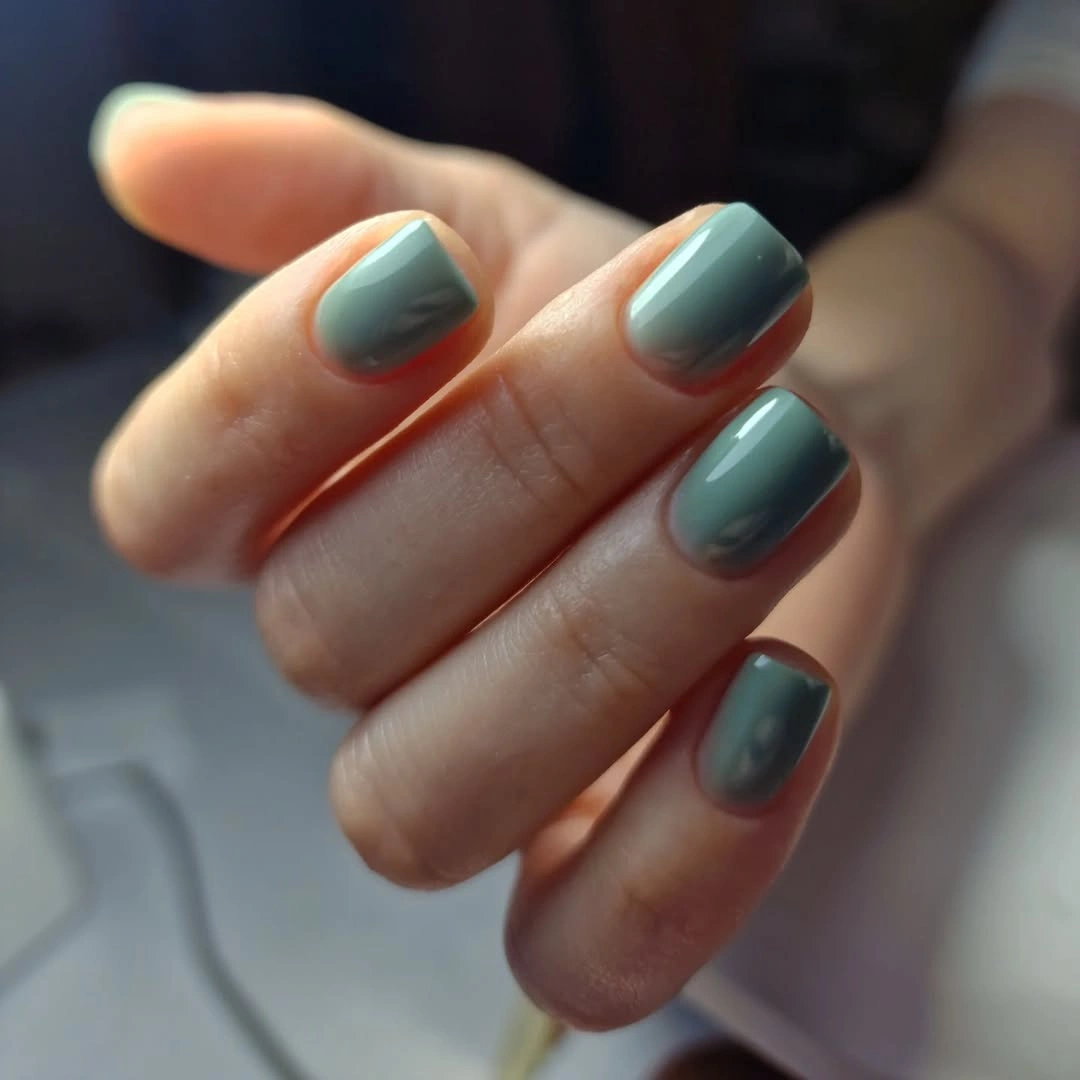 Muted green gray short nails with rounded square shape