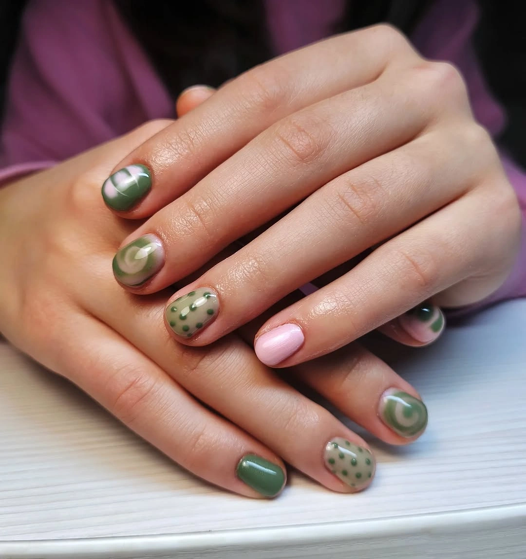 Mixed olive and sage short nails with dots and swirls