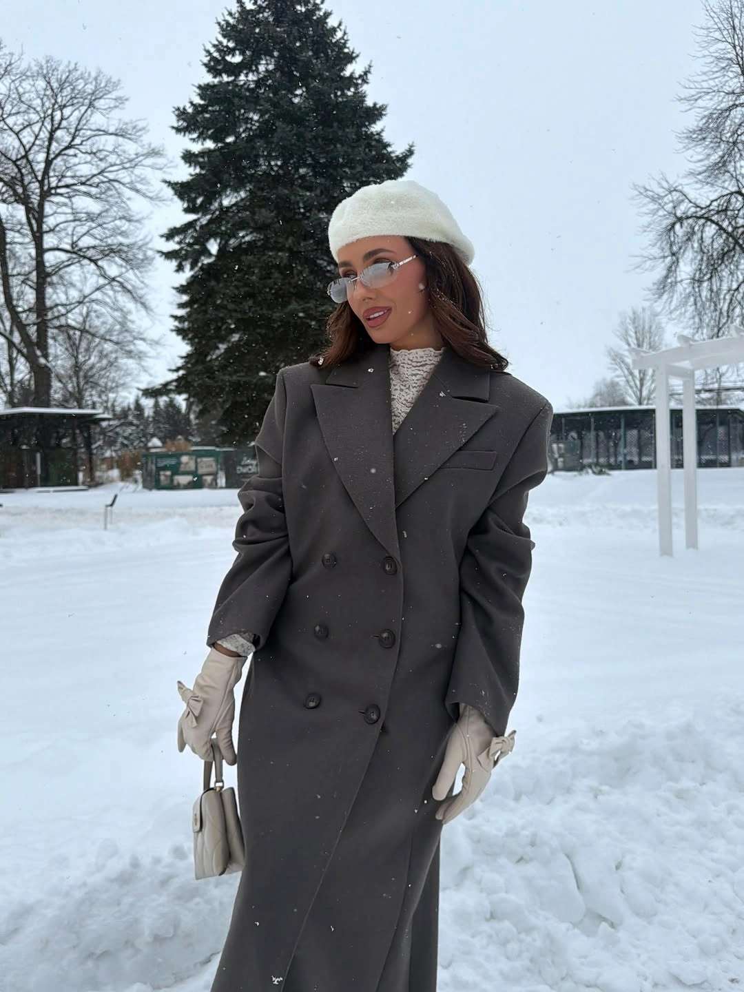 Charcoal double breasted coat with white beanie turtleneck and gloves