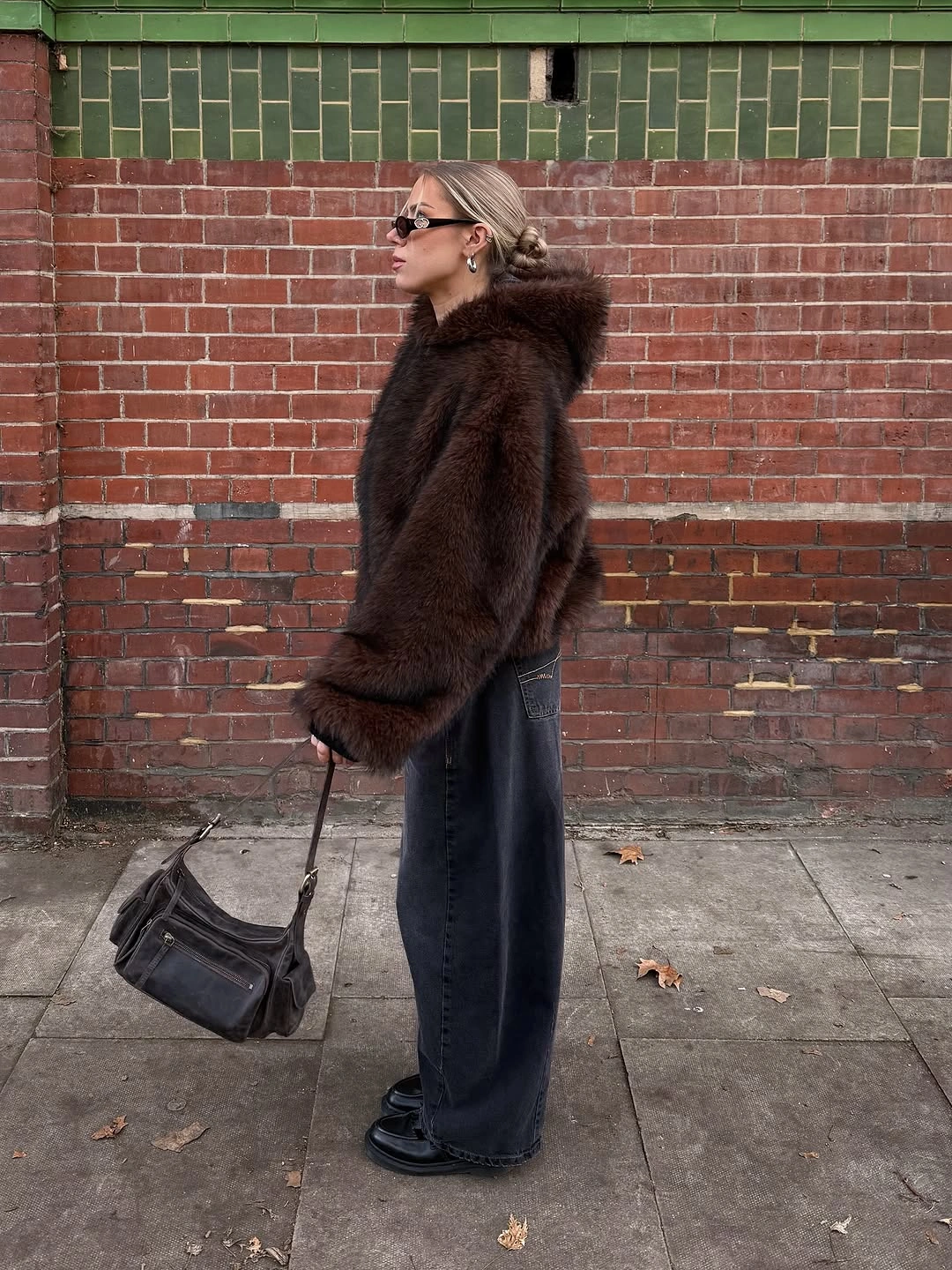 Dark brown plush jacket with charcoal wide trousers and boots